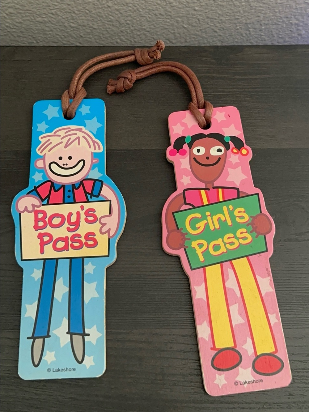 Lakeshore Learning Vintage Boyโs and Girlโs Wooden Passes.
